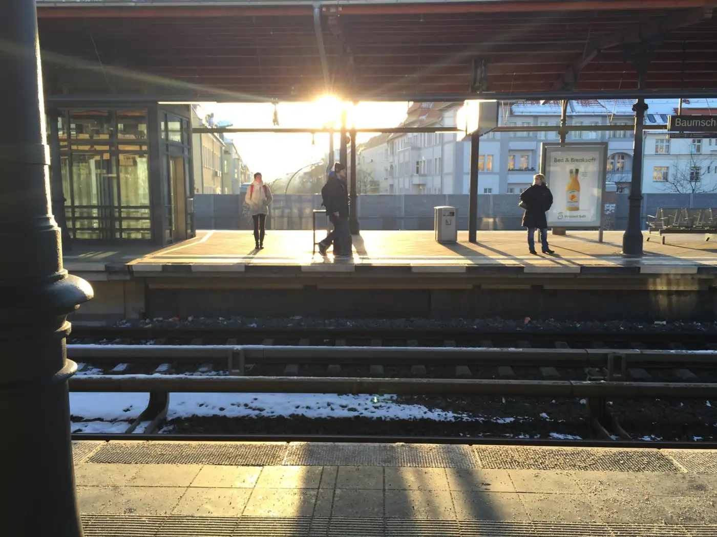 A railway station platform early in the morning